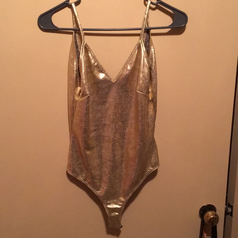 Gold body suit